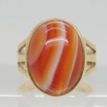 A 9ct gold, banded carnelian ring, size N, weight 5.9gms Condition Report:Available upon request