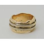 A yellow and white metal sculptural ring, size P1/2, weight 16.3gms Condition Report:Available