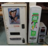 A 20th century Players please cigarette vending machine, a modern tic tac vending machine and a