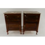 A pair of Victorian mahogany and marble topped bedside cabinets (2) Condition Report:Available