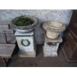 A lot of two stoneware garden plinths and two stoneware garden urns (4) Condition Report:Available