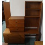 A mid 20th century teak wall display unit, a three drawer chest and a teak coffee table (3)