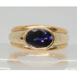 A 9ct gold ring set with a glass bonded sapphire, size L, weight 3.8gms Condition Report:Available