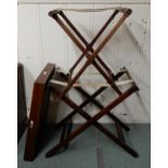 An early 20th century mahogany luggage stand, butlers tray and two folding tray stands (3) Condition