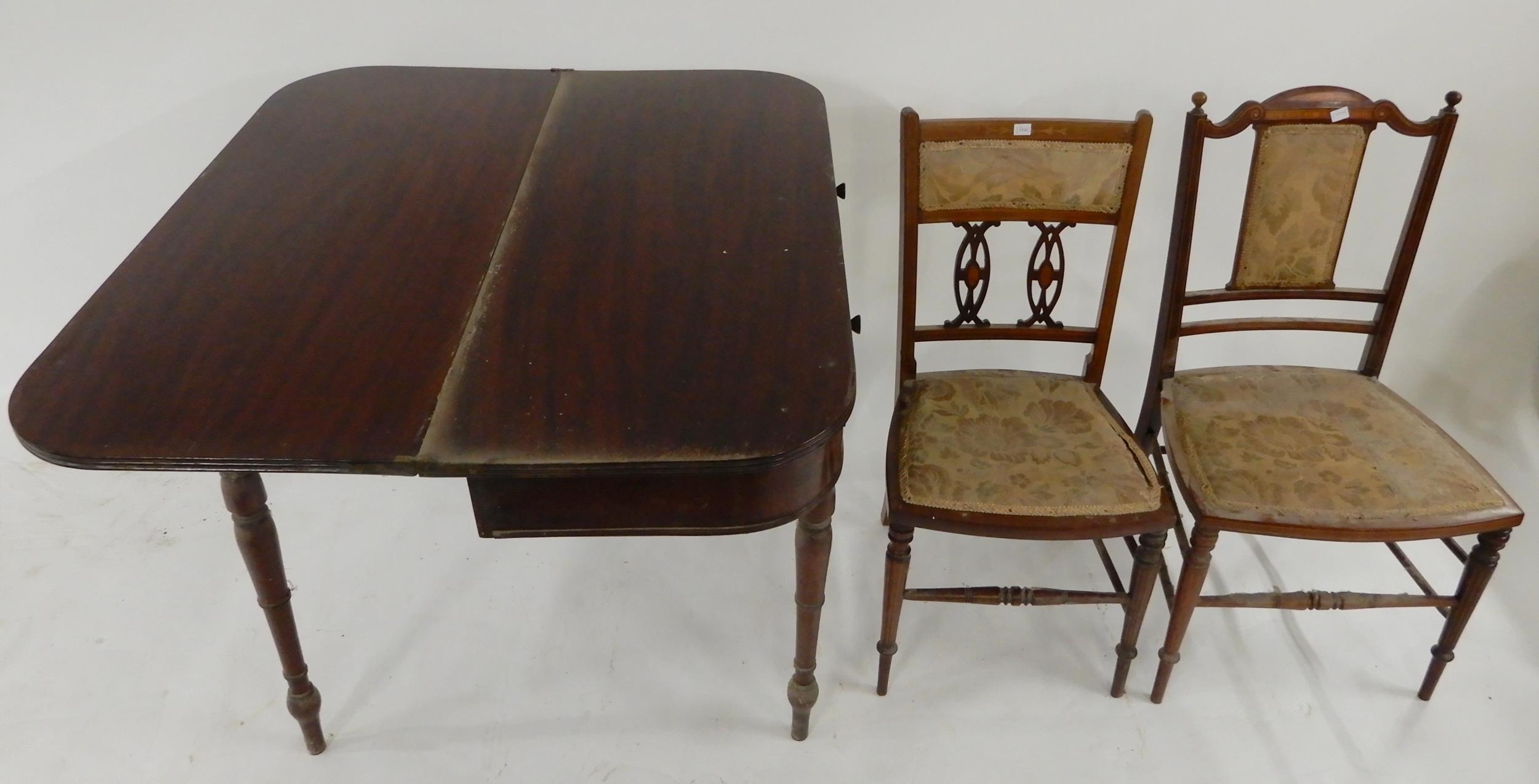 A Victorian mahogany fold over single drawer tea table on turned supports and two Victorian