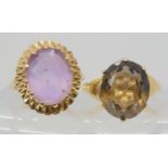 A retro 9ct gold amethyst ring, size I, together with a smokey quartz example size K, weight