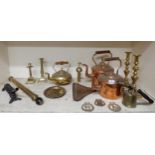 A mixed lot of copper and brass to include kettles, candlesticks etc Condition Report:Available upon