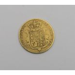 A George IV gold shield half sovereign 1828 Condition Report:Available upon request
