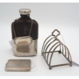A white metal and glass hip flask, the top half of the body covered with leather, with a silver