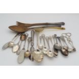 A collection of silver flatware including a William IV Old English pattern berry spoon, by Charles