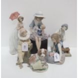 Six Lladro figures including girl and doll etc Condition Report:Available upon request