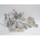 A collection of Lladro groups of sleeping babies, a bell and three animal figures Condition Report: