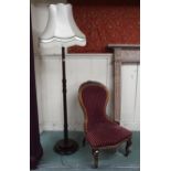 A Victorian walnut spoon back parlour chair with cabriole supports and a mahogany standard lamp (
