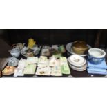 A collection of butter and cheese dishes, teapots, plates etc Condition Report:Not available for