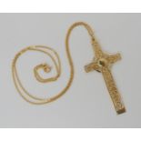 A 9ct gold Celtic cross and 18ct gold chain, dimensions of the cross with bail 6.8cm x 3cm weight