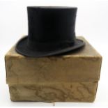 A boxed silk top hat, of medium-large size (measures 20.5cm front to back and 16cm side to side)