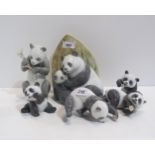 A collection of Lladro and Nao figures of pandas Condition Report:Available upon request