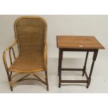 A 20th century Dryad wicker armchair and an oak barley twist occasional table (2) Condition Report: