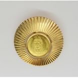 A gold 3gm Venezuelan Indian chief coin in a yellow metal brooch mount, weight combined 11.3gms. The