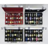 A large selection of primarily gents fashion wristwatches, contained in fitted flight cases (4)
