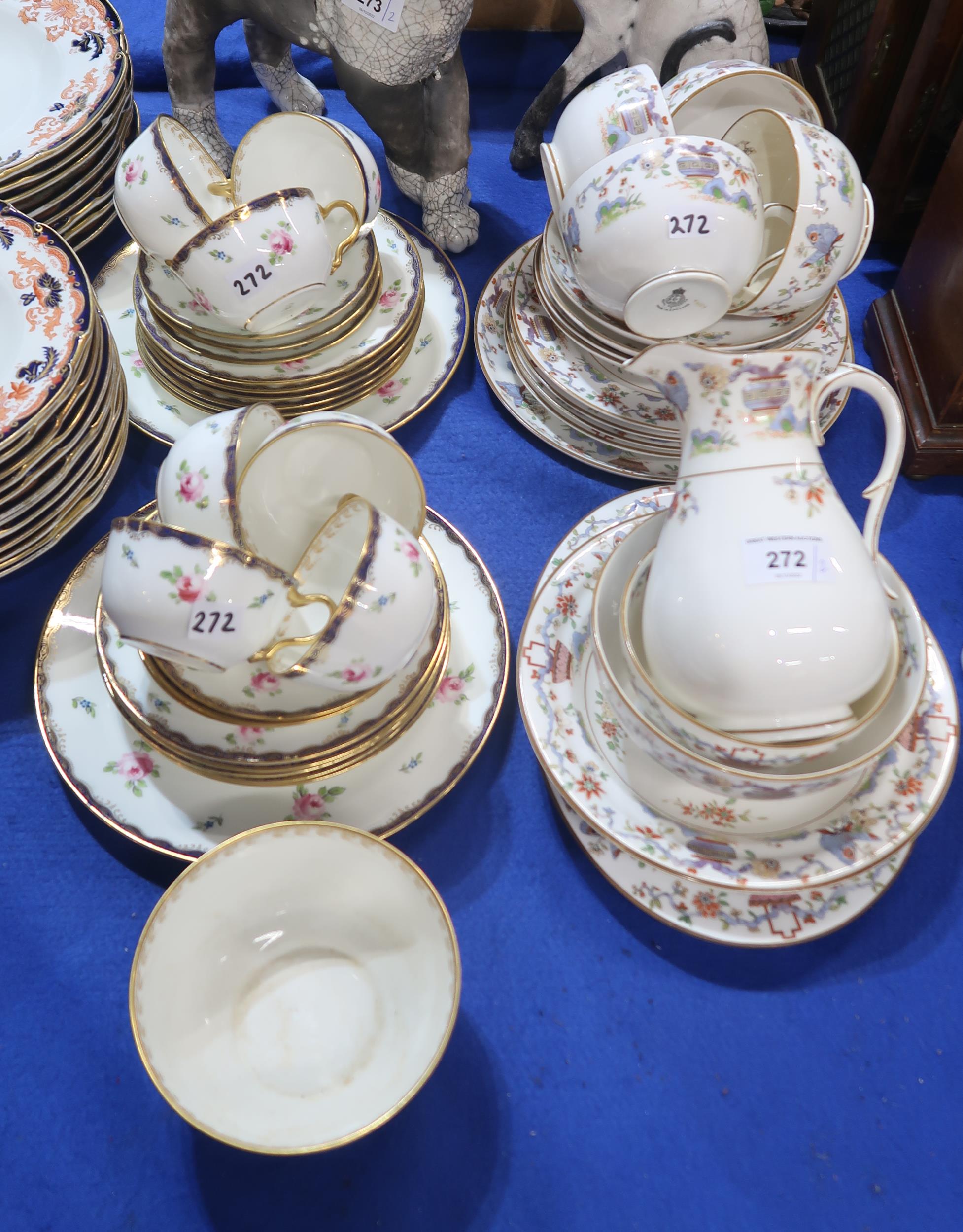 A Wedgwood part teaset decorated with pink roses together with a Royal Worcester part breakfast