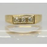 A 9ct gold three stone diamond ring, size N1/2, weight 3gms Condition Report:Available upon request