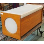A 20th century teak ottoman chest cream vinyl upholstered hinged seat, 43cm high x 96cm wide x