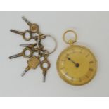 An 18ct gold open face fob watch, diameter 4cm, weight including mechanism 53.3gms With a collection