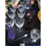 A Edinburgh crystal thistle shaped and cut drinking glass, six Caithness drinking glasses with
