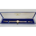 A 9ct gold Favre -Leuba ladies watch and strap, in original box, weight including mechanism 14.