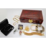 A gold plated wide bangle, a Bugs Bunny brooch by Karu, Fifth Avenue, and other items Condition