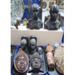 African carved hardwood busts, a pair of bookends, wall masks etc Condition Report:Available upon