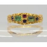 A 15ct gold garnet and green gem set Victorian ring, hallmarked Birmingham 1865, size O, weight 2.