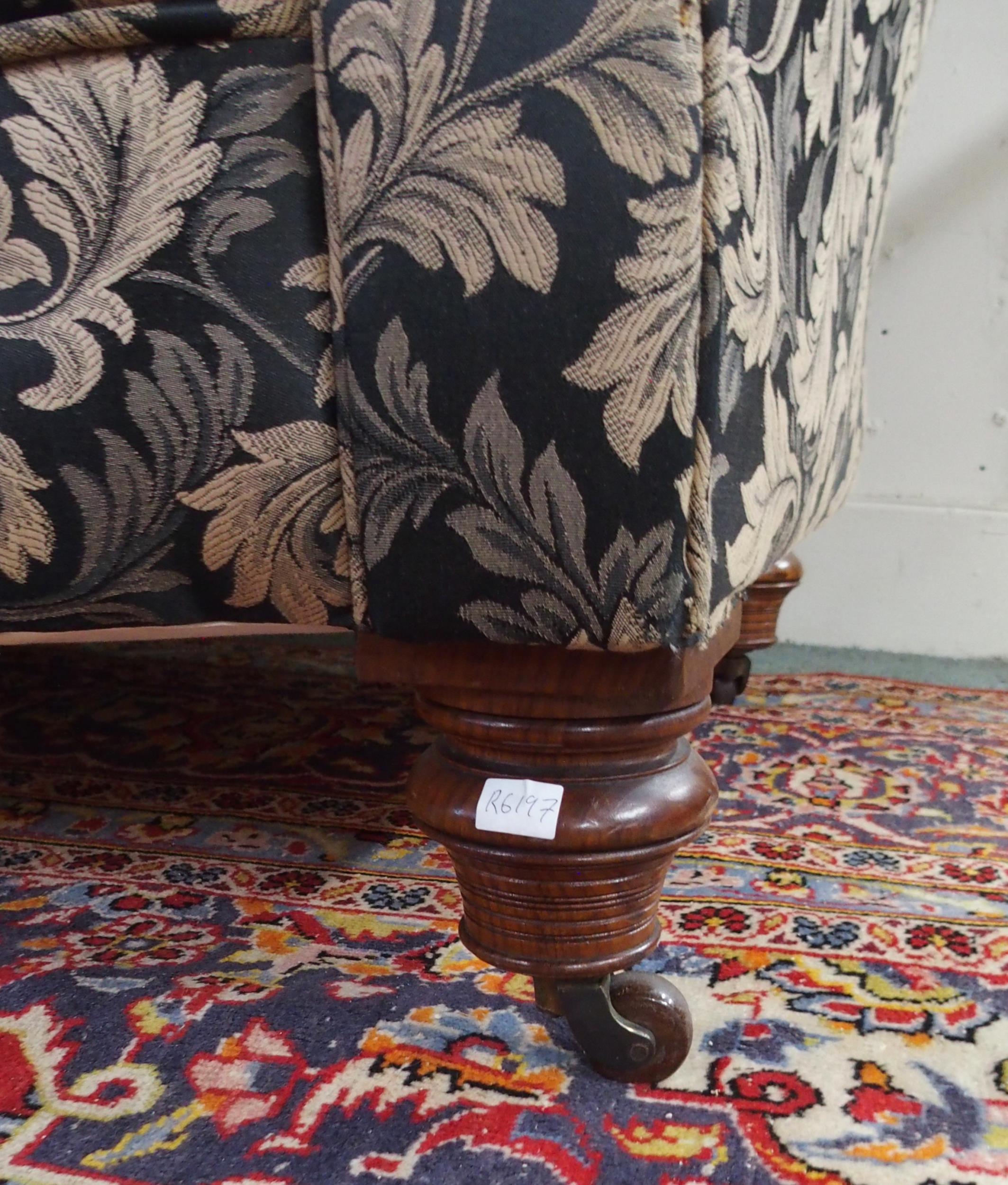 A Victorian button back three seater settee upholstered in a black and gilt acanthus leaves fabric - Image 5 of 5