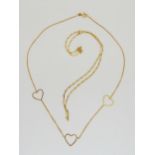 An 18ct gold heart motif necklace, length 42cm, weight 3gms, together with a 14ct gold figaro