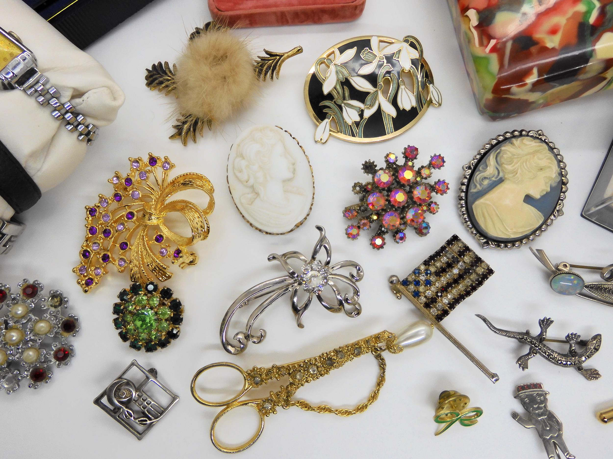 An early plastic box filled with vintage costume jewellery and watches Condition Report:Not - Image 6 of 6