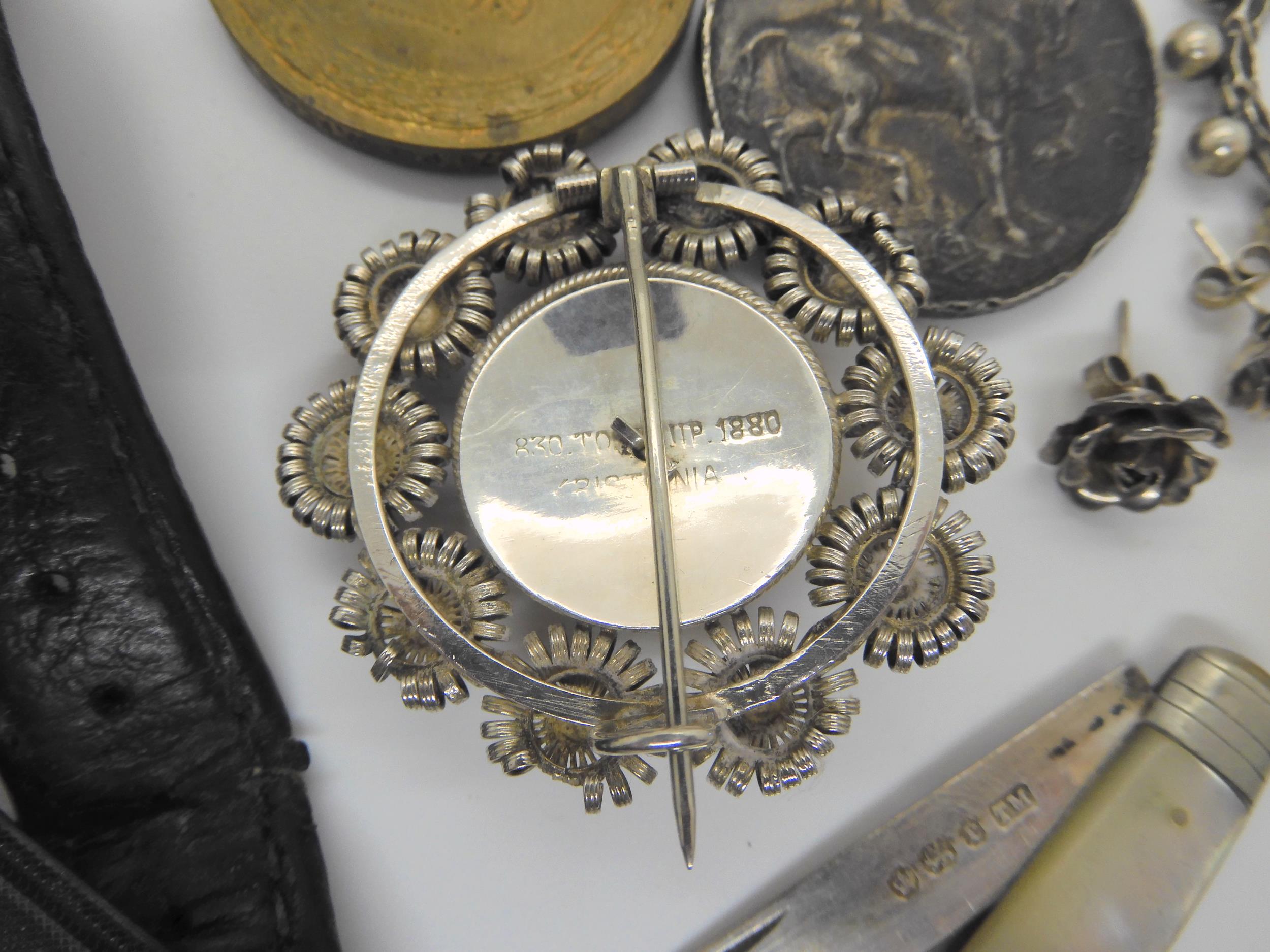 A Victorian silver crown, One Dollar coin, Victorian Jubilee coin, 1st World war metals, a Norwegian - Image 7 of 7