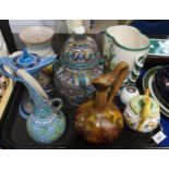 A collection of decorative ceramics including a Moroccan vase, Chameleon Ware genie lamp, Rubens