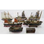 A collection of decorative wooden model boats Condition Report:Available upon request