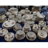 A extensive Royal Worcester Evesham dinner service comprising cups and saucers, bowls, plates,