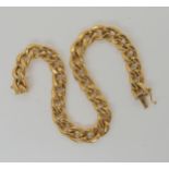 A 9ct gold hollow curb chain bracelet, length 21cm, weight 13.9gms Condition Report:One link has a