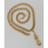 A 9ct gold diamond set Wizard pendant on a curb chain necklace, length of pendant 4.5cm, length of