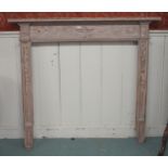 A 19th century carved pitch pine fire surround, 150cm high x 167cm wide x 16cm deep Condition
