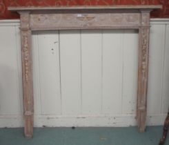 A 19th century carved pitch pine fire surround, 150cm high x 167cm wide x 16cm deep Condition