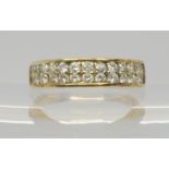 A yellow metal eternity ring set with estimate 0.40cts of brilliant cut diamonds, finger size Q,