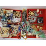 A large jewellery box full of vintage costume jewellery to include items by Moda, Thomas Mott,