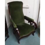 A Victorian mahogany framed slipper armchair with green upholstery Condition Report:Available upon