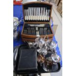 A cased mahogany two drawer canteen of stainless steel cutlery, a cased set of stainless steel