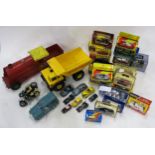 A varied selection of toy and scale model vehicles, to include a large Tri-ang Express motorcar, a