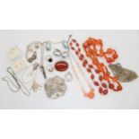 A string of carnelian beads, two vintage glass bead necklaces, silver chains and other items of